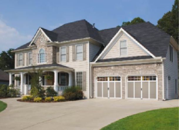 Stone modern contemporary house with black roof